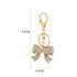 AGCK1083 - Sparkly Gold Metal Bow Rhinestone Bag Charm Key-Ring